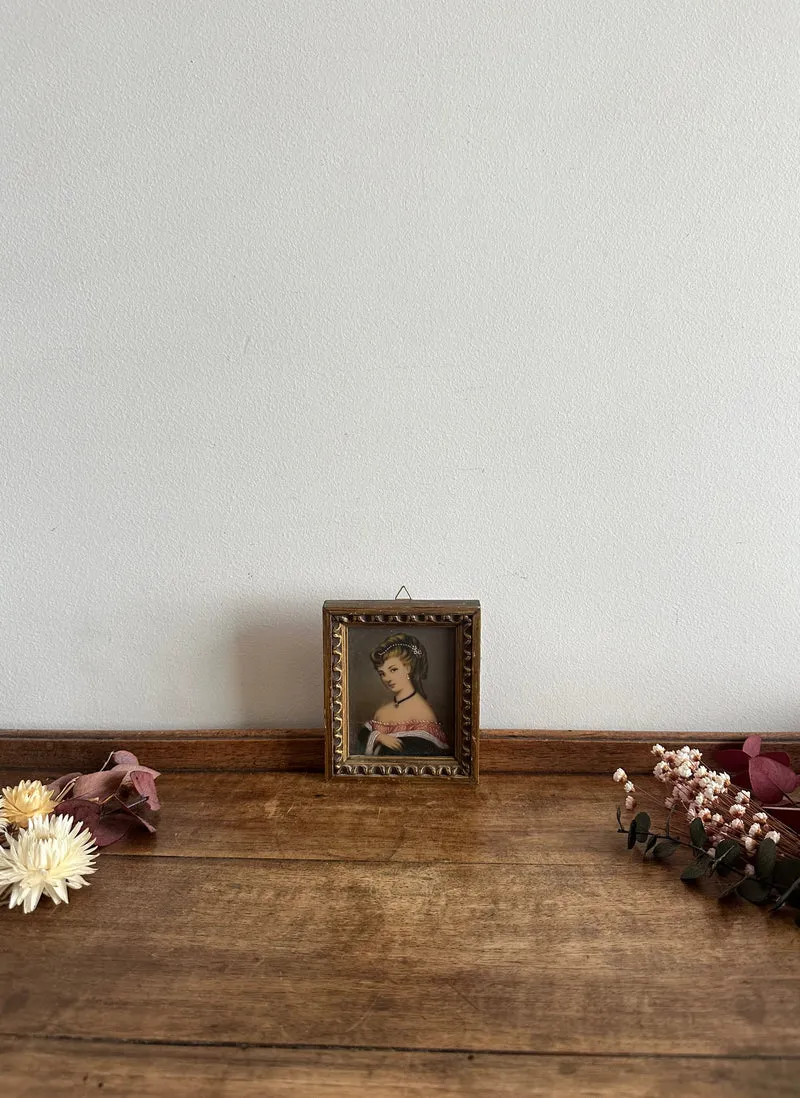 Impression portrait de jeune femme encadrement en bois doré
