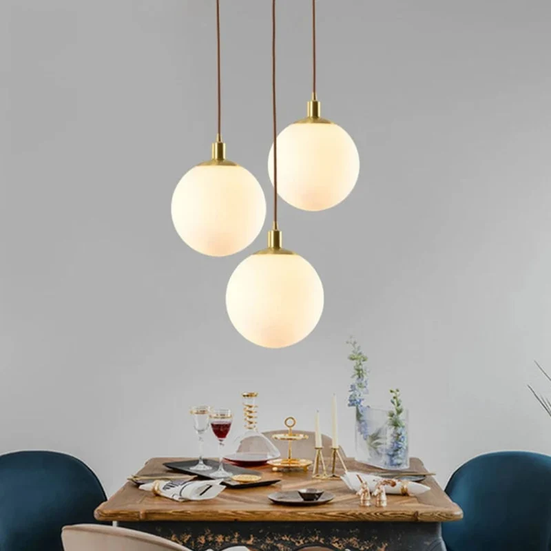 Suspension Luminaire Boule Dorée en Verre – 3 Tailles pour un Look Épuré