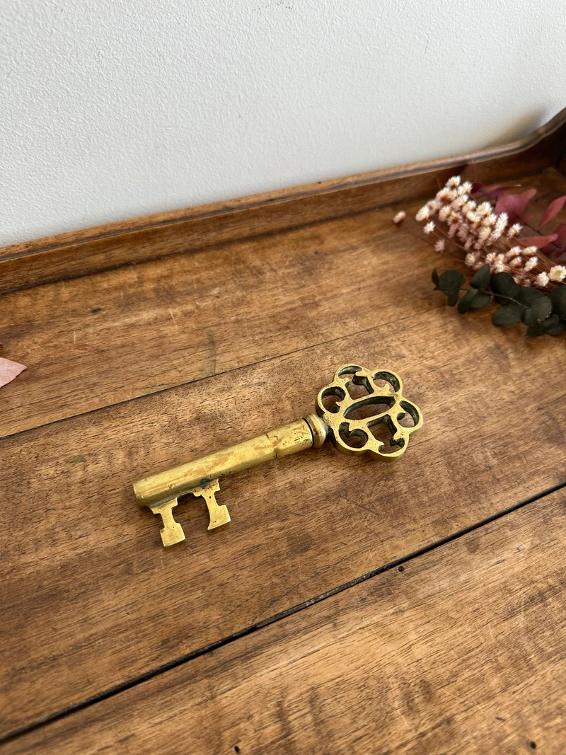 Clé tire-bouchon en bronze doré