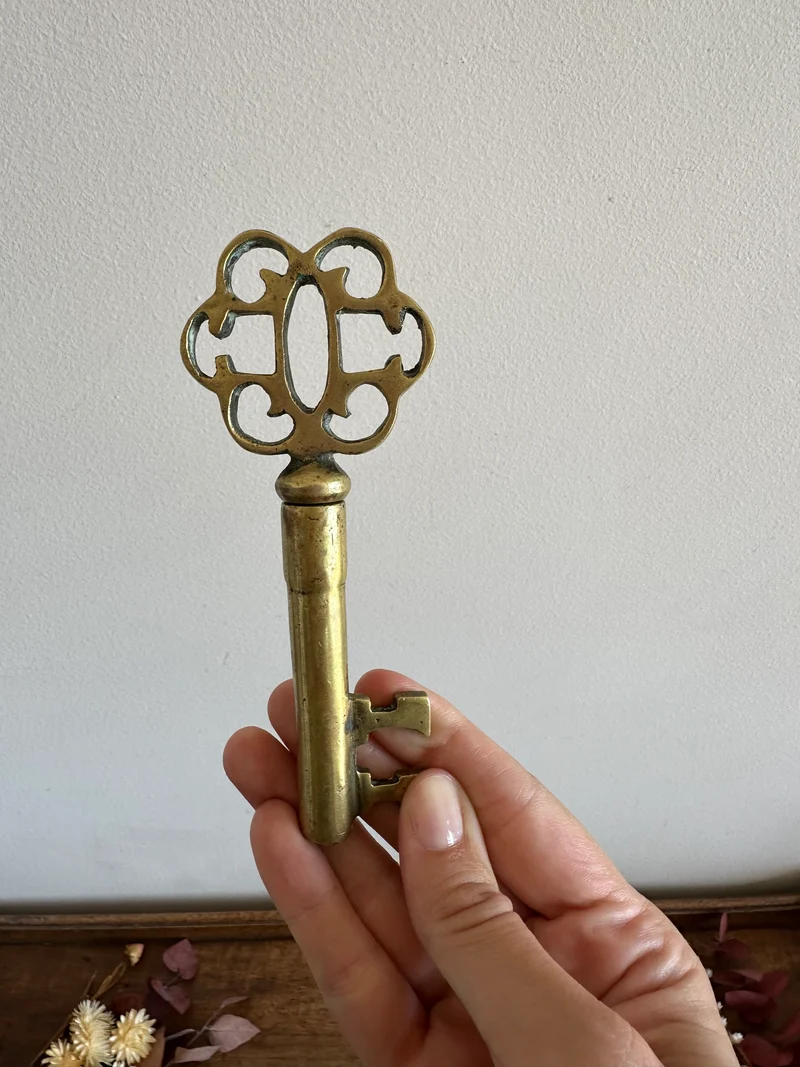 Clé tire-bouchon en bronze doré