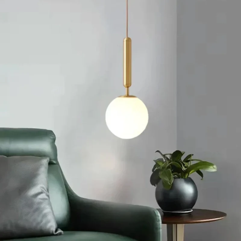 Luminaire Suspension Doré en Verre – Combinez Deux Styles Scandinaves