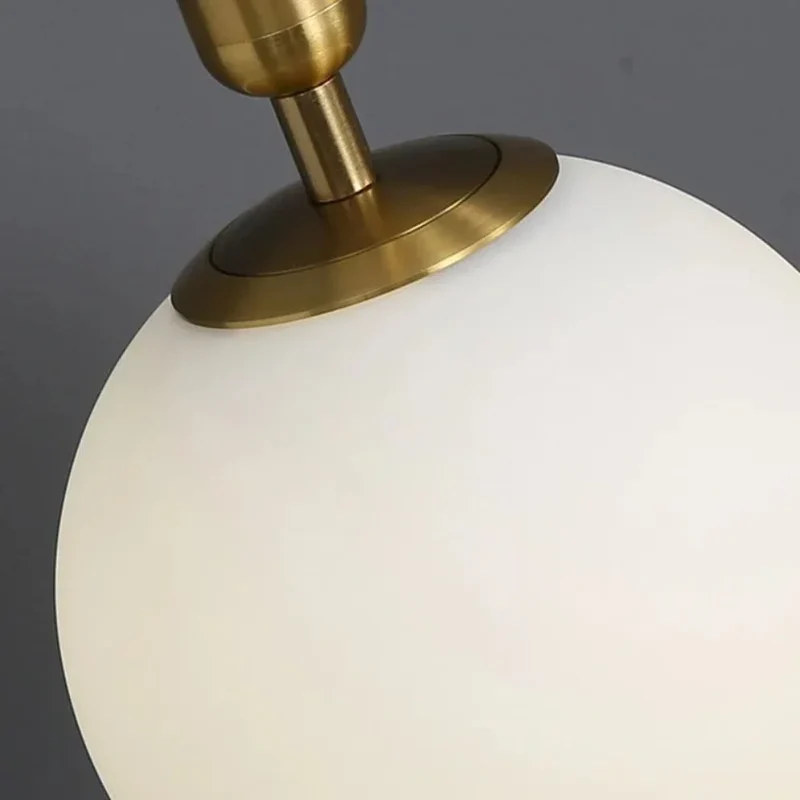 Luminaire Suspension Doré en Verre – Combinez Deux Styles Scandinaves