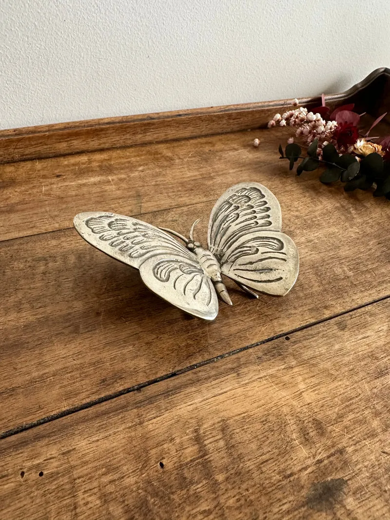 Papillon décoratif en métal argenté