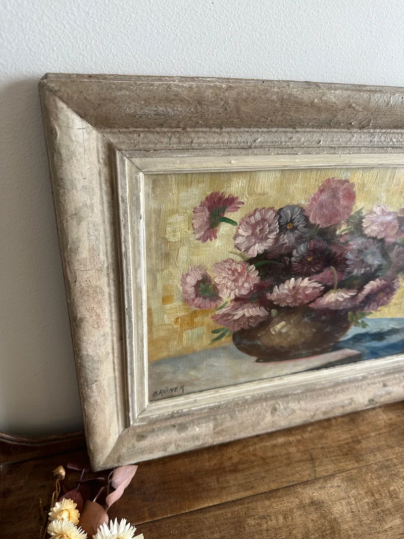Peinture signée Gruner bouquet de fleurs mauves sur toile