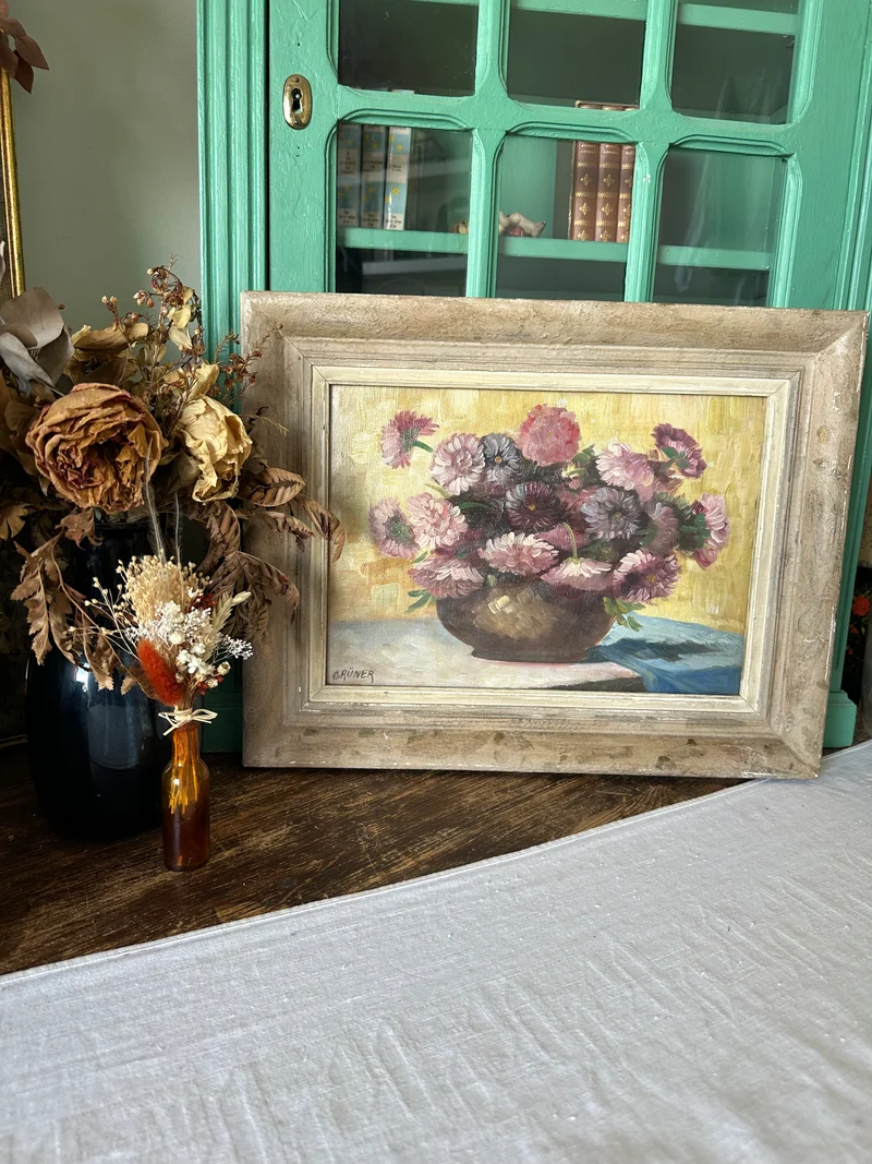 Peinture signée Gruner bouquet de fleurs mauves sur toile