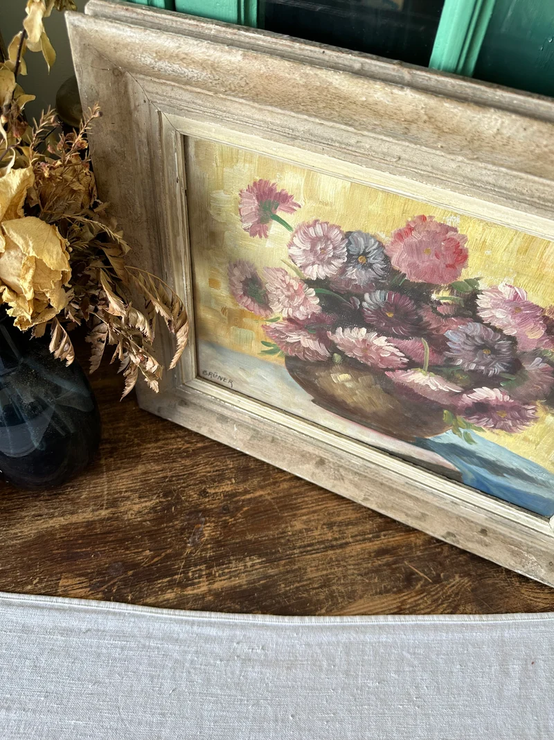 Peinture signée Gruner bouquet de fleurs mauves sur toile