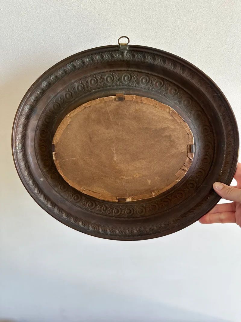 Miroir ovale en cuivre martelé