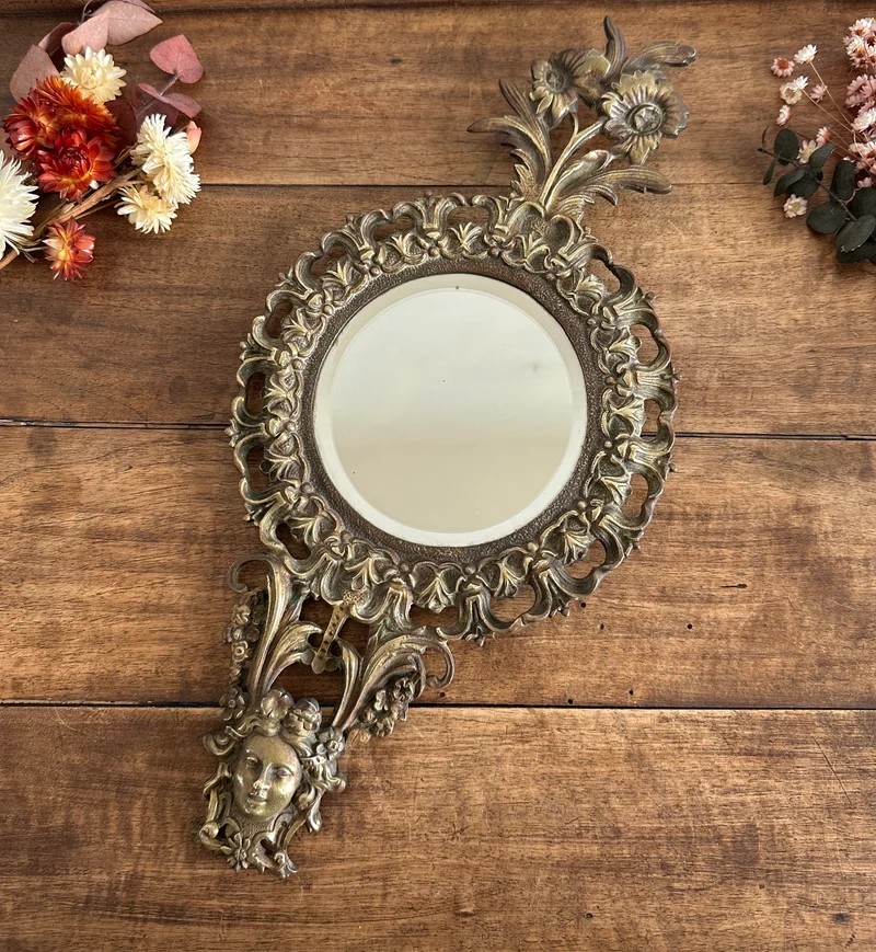 Miroir en bronze 19ème style baroque fronton marguerites