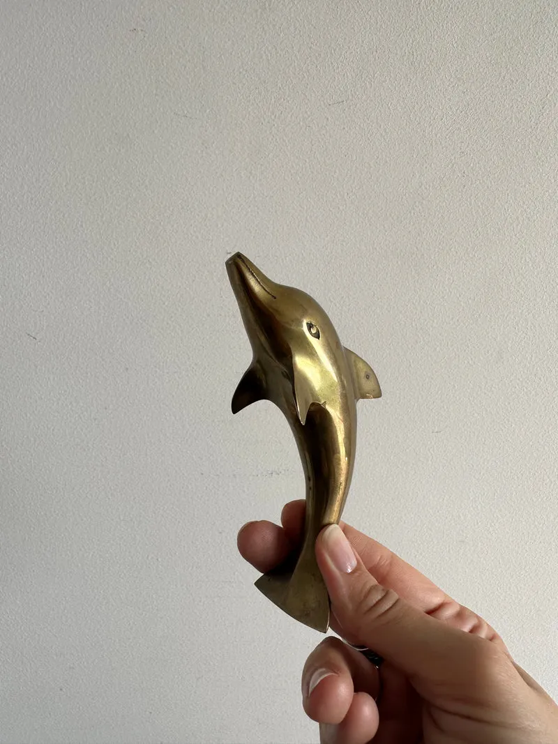 Dauphins en laiton anciens