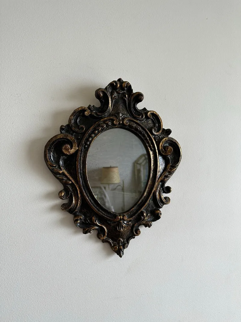 Miroir florentin en bois couleur noir et or