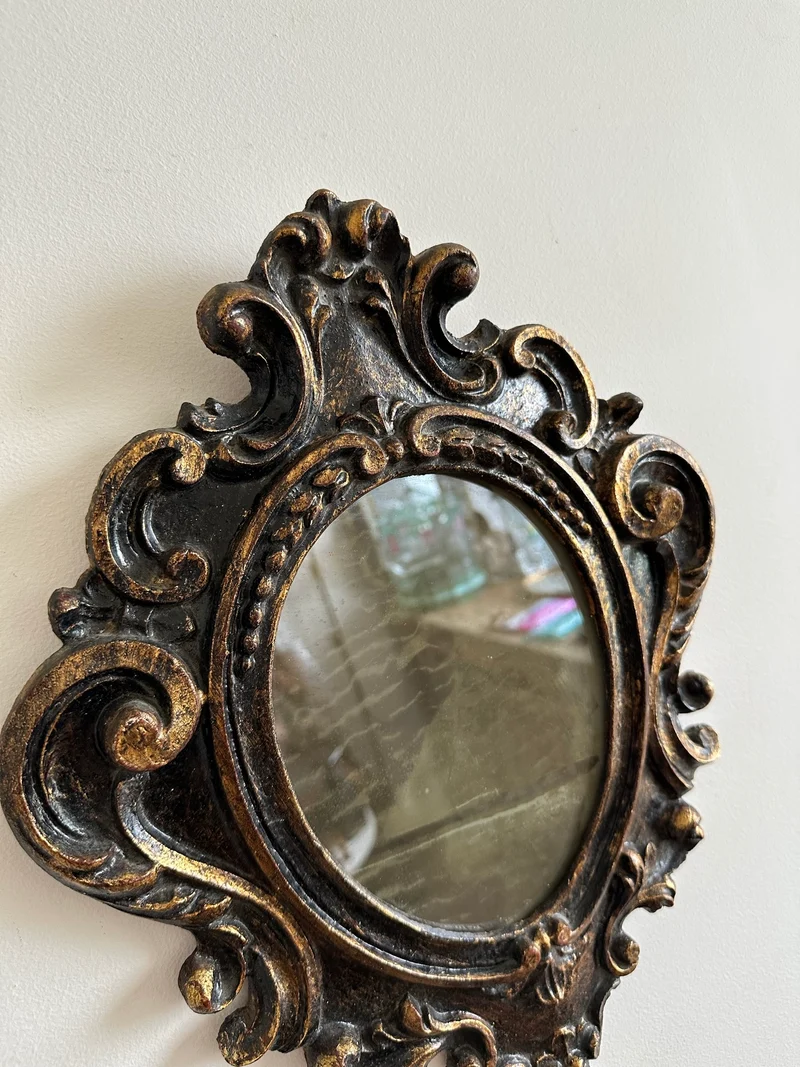 Miroir florentin en bois couleur noir et or