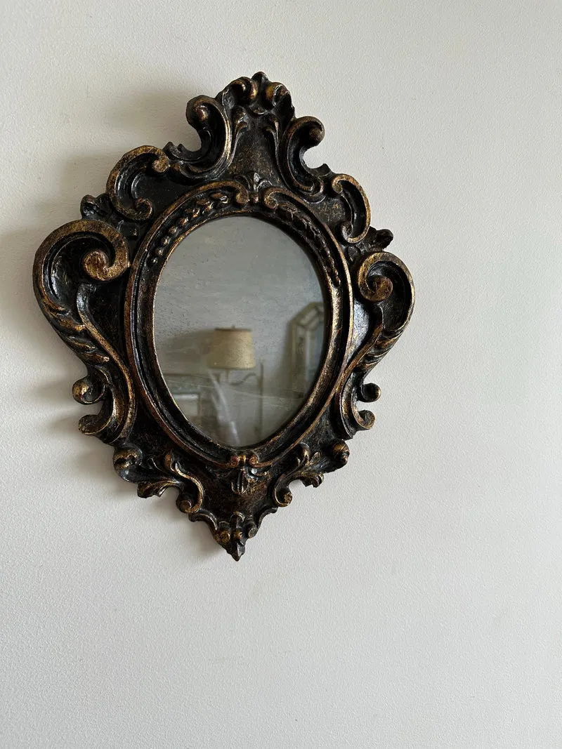 Miroir florentin en bois couleur noir et or
