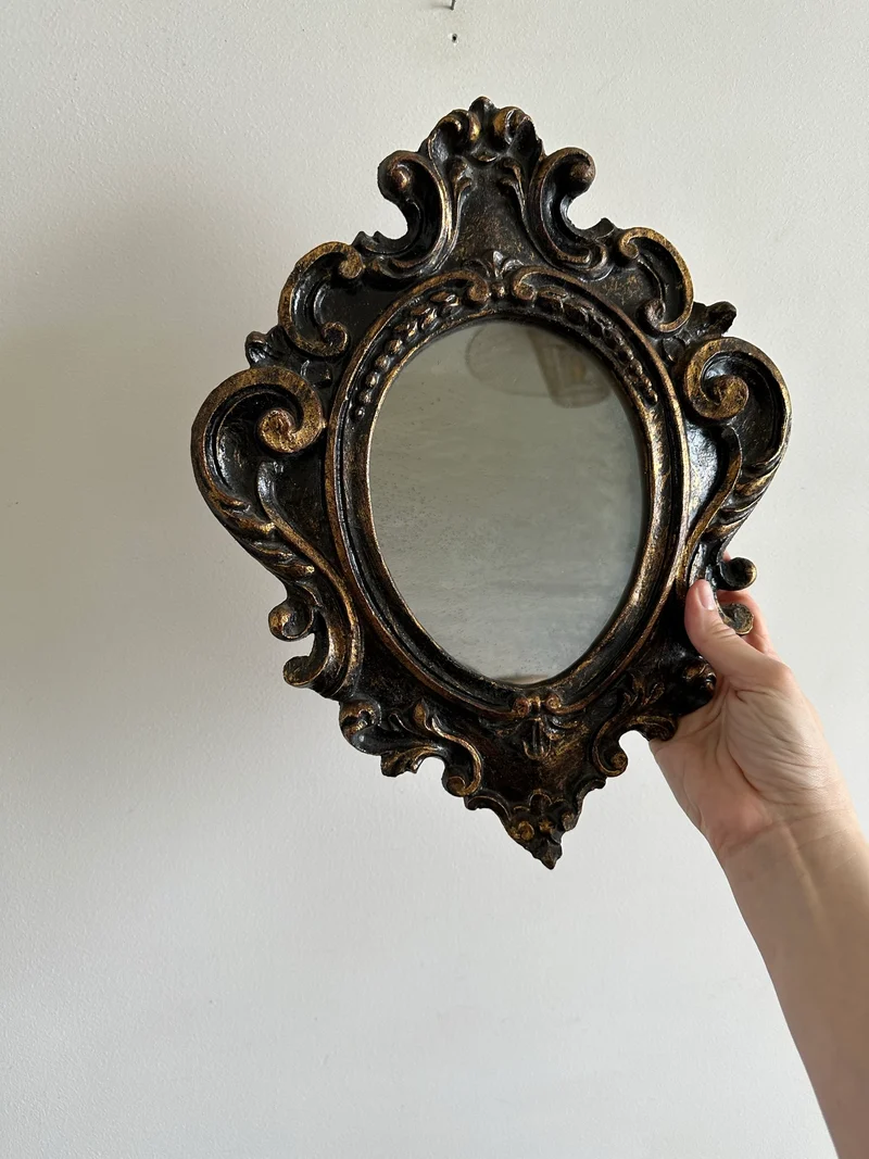 Miroir florentin en bois couleur noir et or