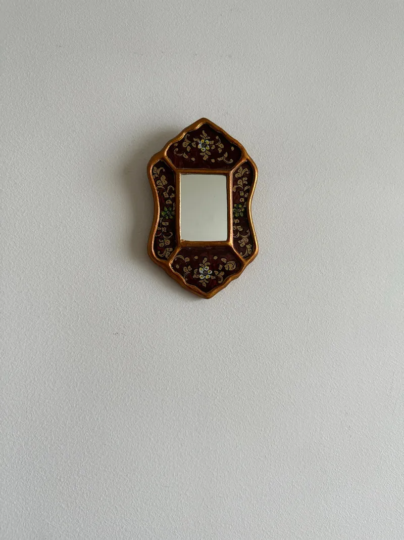 Miroir péruvien émaillé or et marron glacé