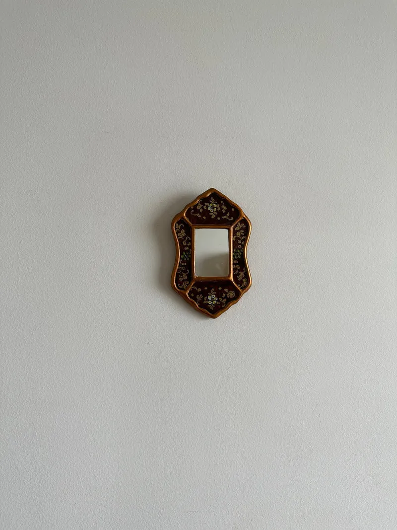 Miroir péruvien émaillé or et marron glacé