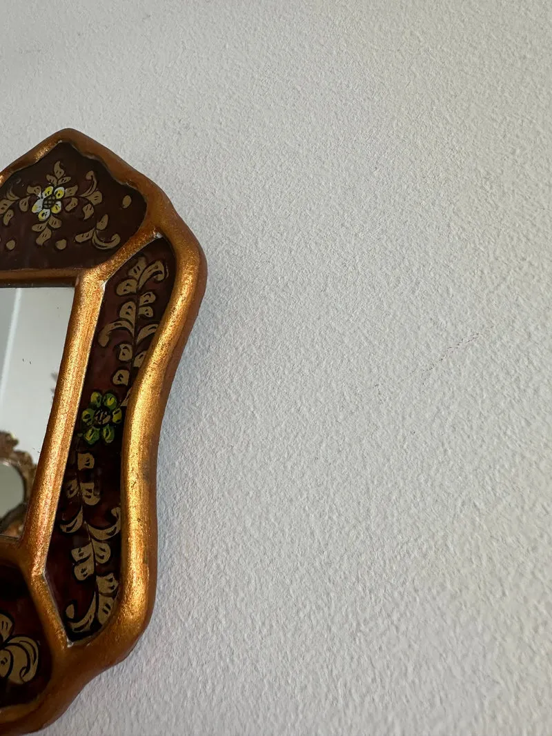 Miroir péruvien émaillé or et marron glacé