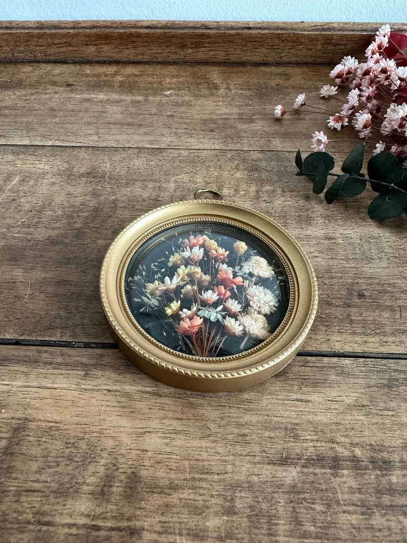 Fleurs séchées sous verre dans médaillon en plastique XS