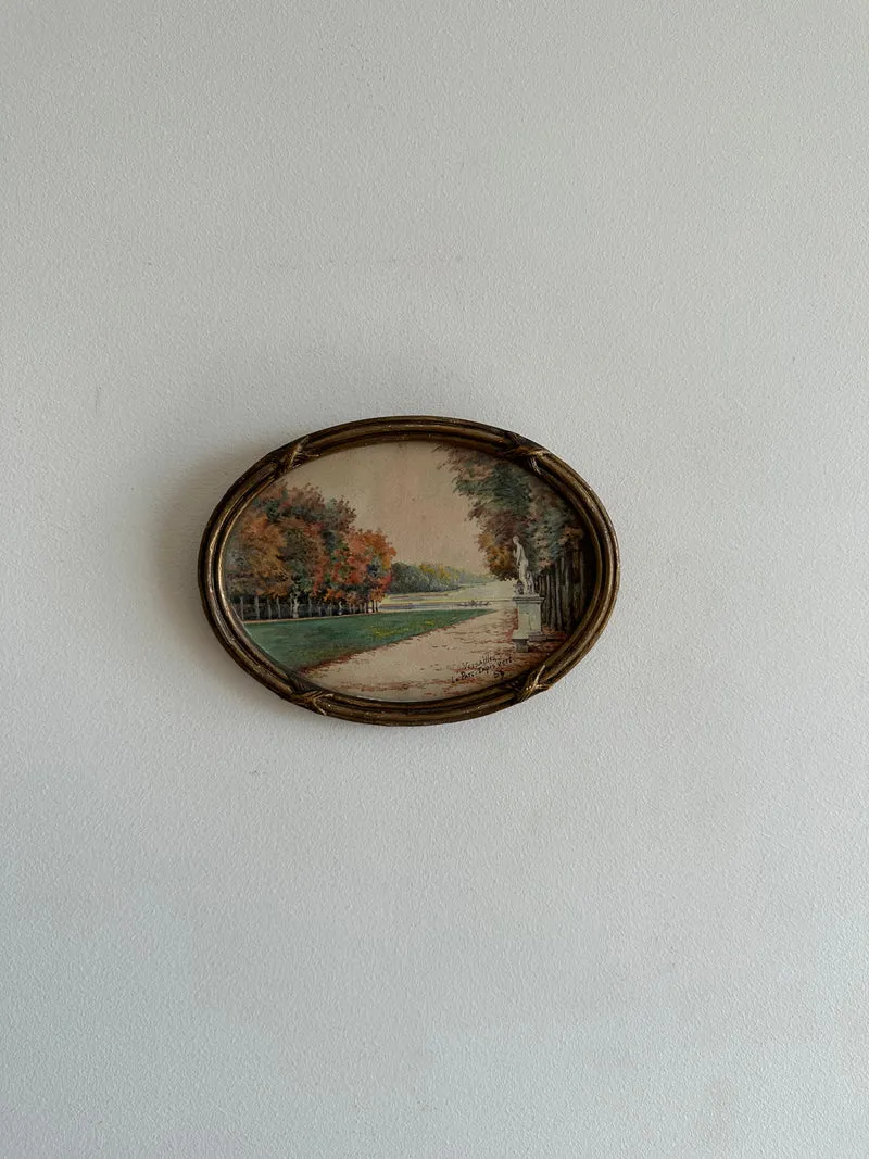 Peinture signée représentant le parc de versailles années 20