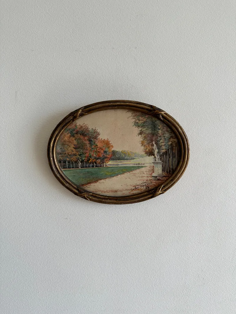 Peinture signée représentant le parc de versailles années 20