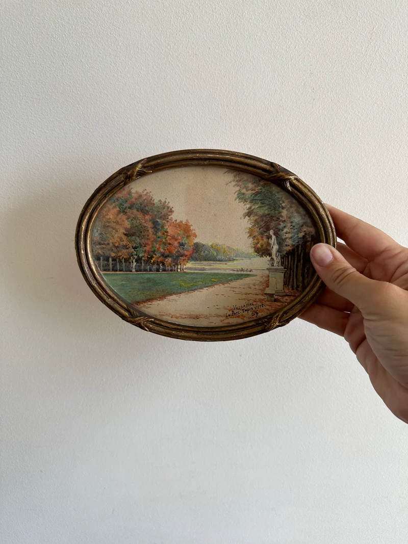 Peinture signée représentant le parc de versailles années 20