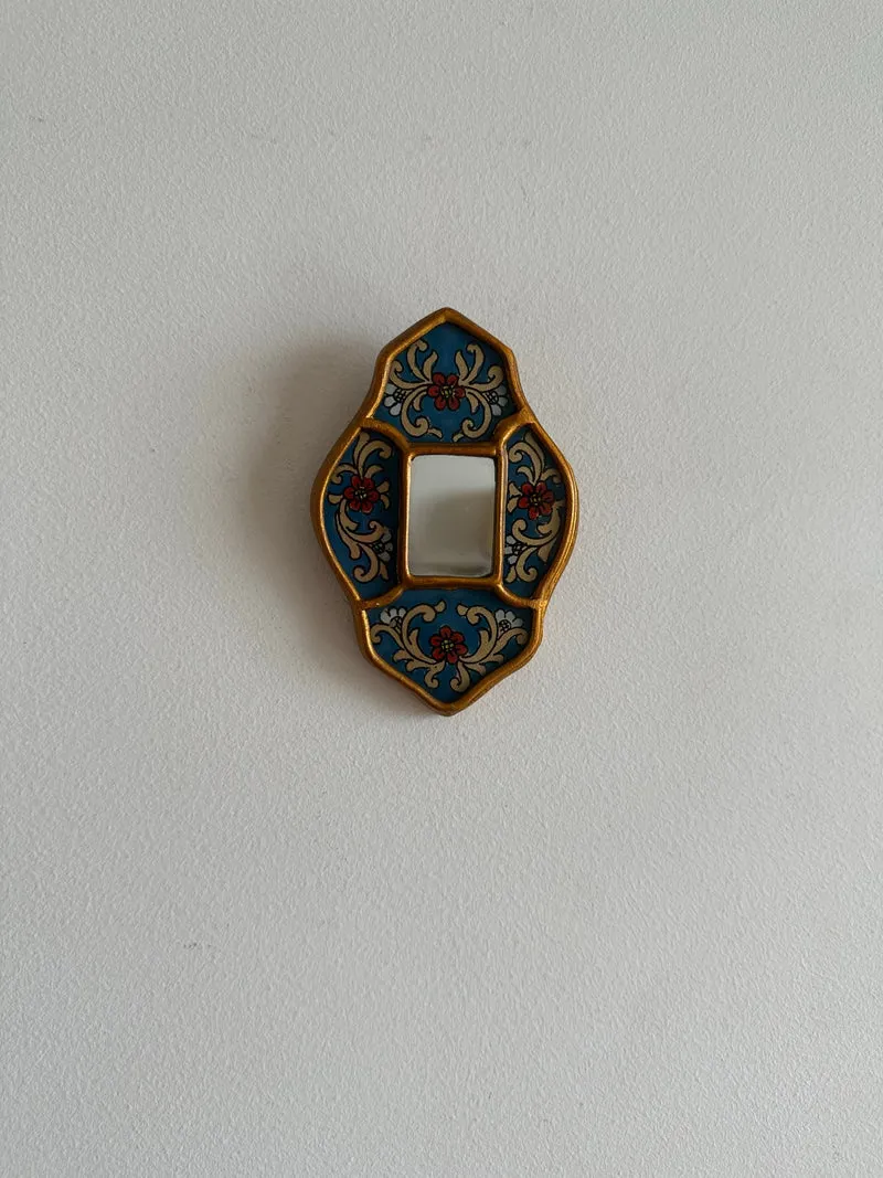 Miroir émaillé péruvien bleu et or