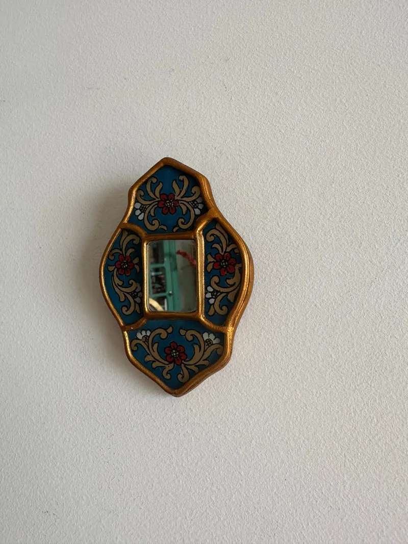 Miroir émaillé péruvien bleu et or