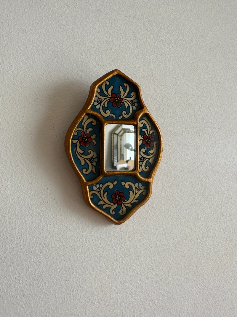 Miroir émaillé péruvien bleu et or