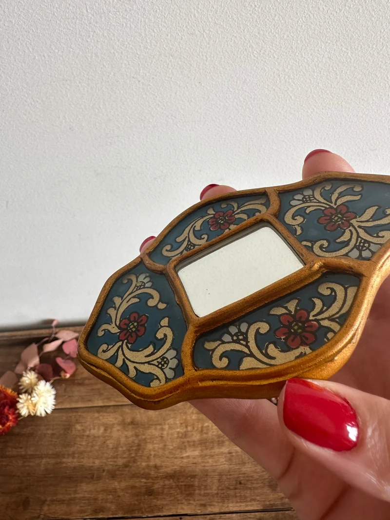 Miroir émaillé péruvien bleu et or