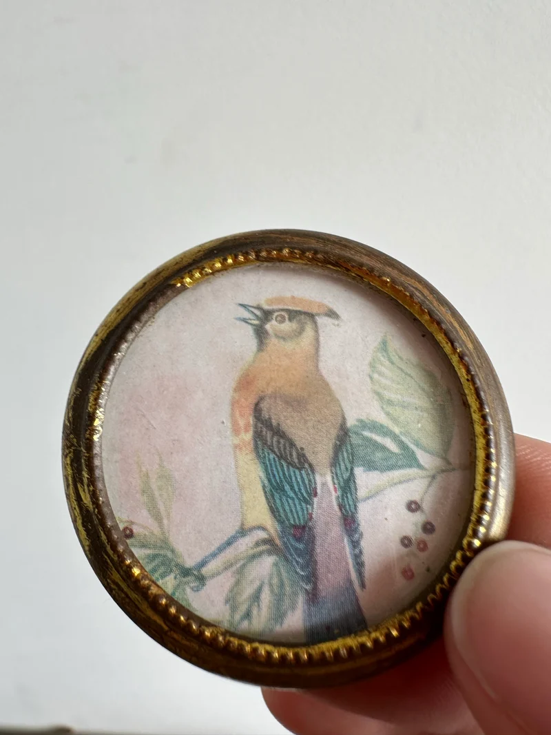 Médaillon oiseau en métal doré XIX ème