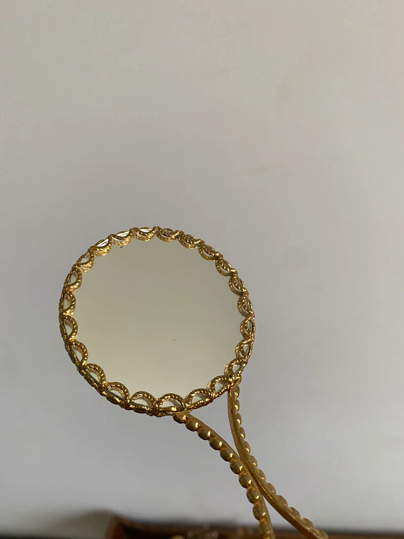 Miroirs à main miniatures en porcelaine