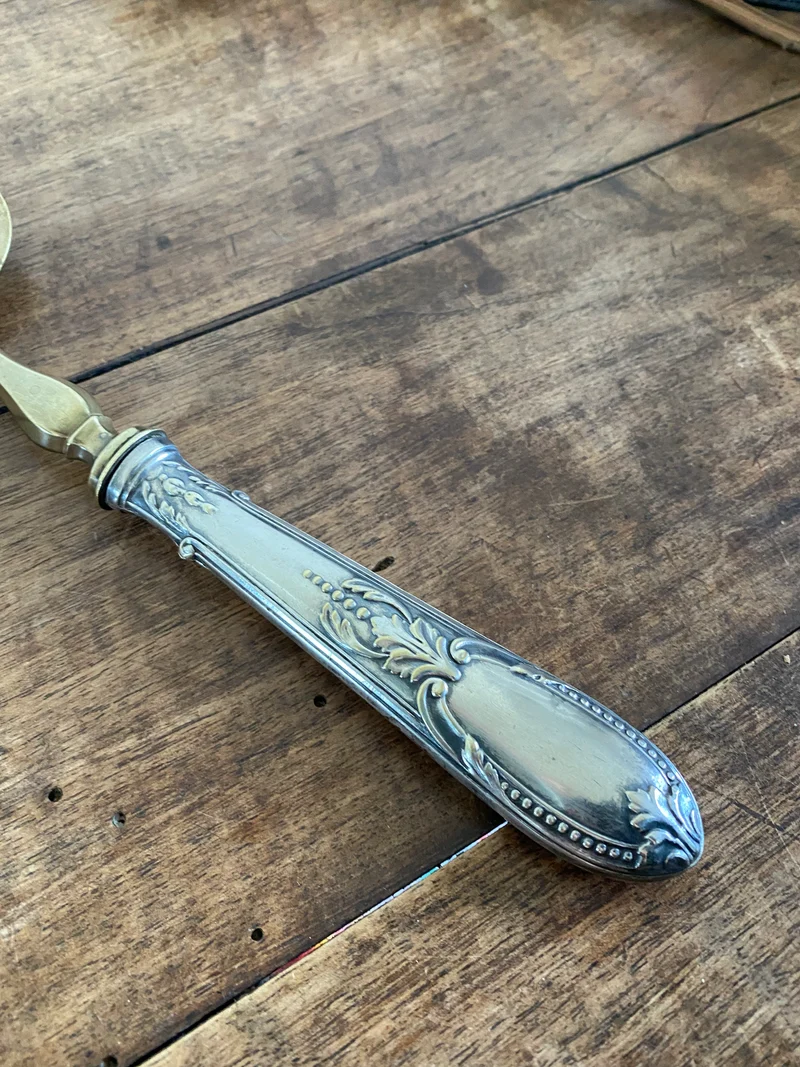 Pelle à tarte en métal argenté et doré détails travaillés