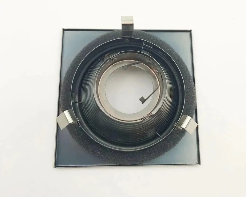 4 Inch Recessed Can Light With Square Trim And Antique Bronze Finish Adjustable 30 Degree GU10 Compatible 120 Volt Low Voltage Smooth Stepped Baffle Knockout Finish Straight Shot Install