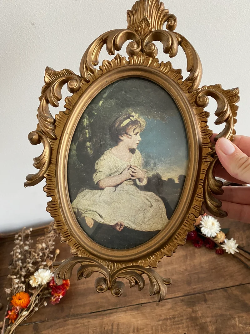 L'âge de l'innocence cadre baroque doré
