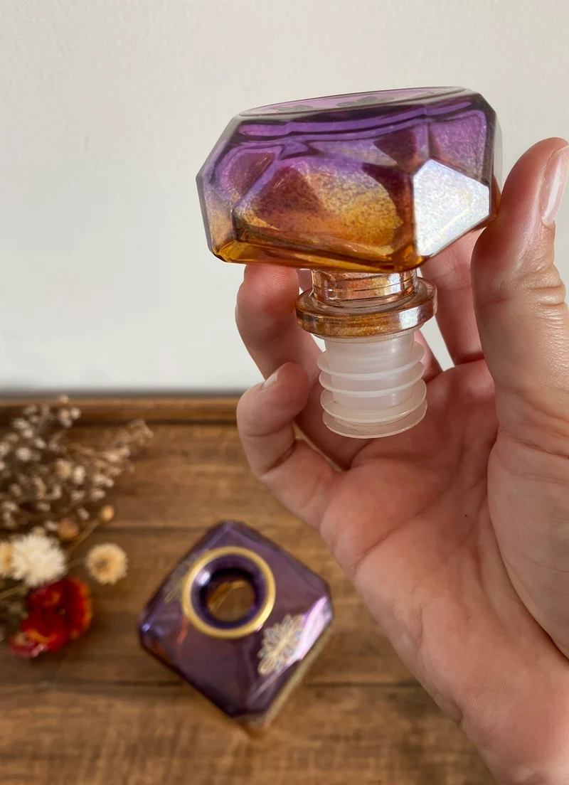 Bouteille dorée et mauve en verre décoration florale