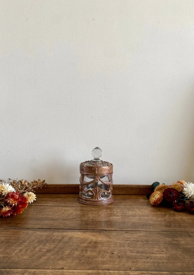 Bonbonnière en verre cerclée de cuivre