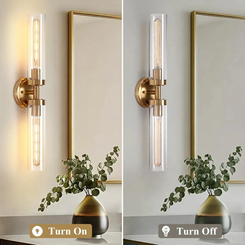 Top Shelf Dual Gold Wall Sconces For Bathroom Vanity With Clear Glass Cylinder Shades And Effortless Vertical Or Horizontal Mounting Sleek Modern Indoor Lighting