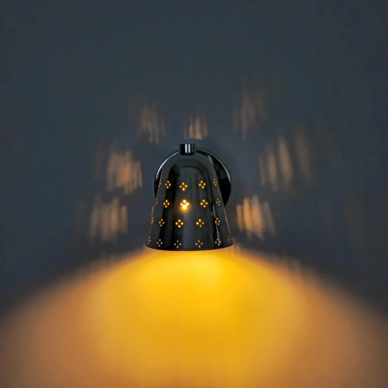 Handcrafted Solid Brass Wall Sconce Sporting A Slick Mid Century Cone Shape With Perforated Metal Accents Casting Killer Shadow Effects For Top Tier Ambient Lighting Vibes