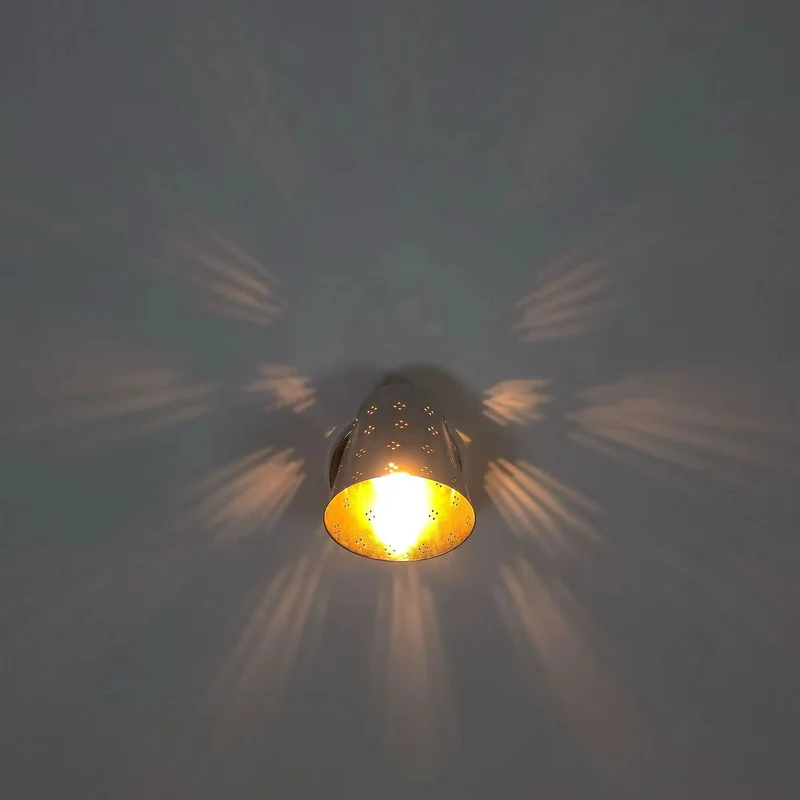 Handcrafted Solid Brass Wall Sconce Sporting A Slick Mid Century Cone Shape With Perforated Metal Accents Casting Killer Shadow Effects For Top Tier Ambient Lighting Vibes