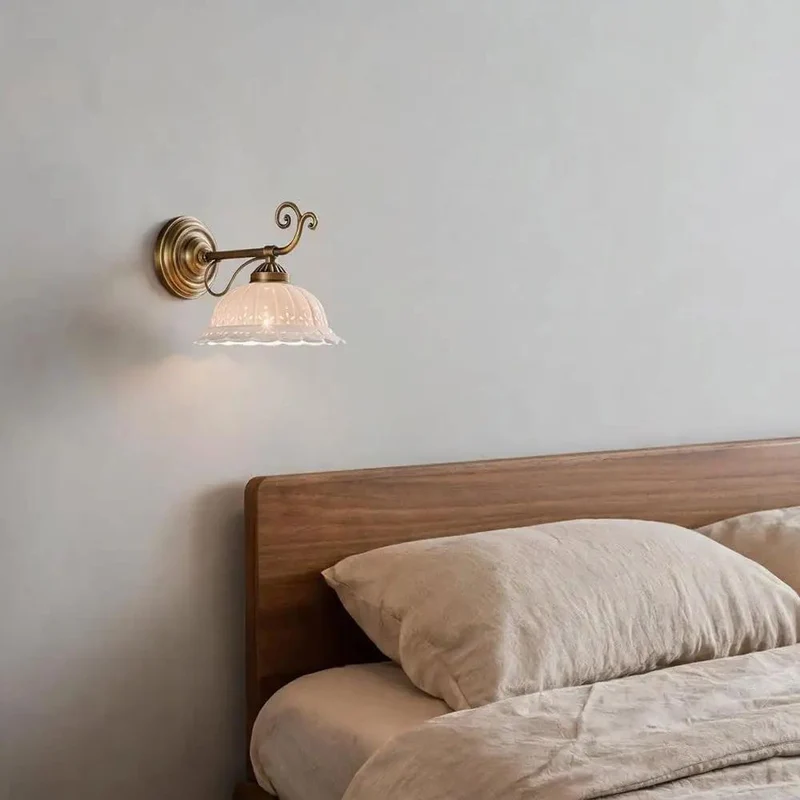 Premium Nine Inch Antique Brass Ceramic Wall Sconce Featuring Floral Cutout Designs For Killer Room Vibes And Top Shelf Bedroom Lighting Fixtures