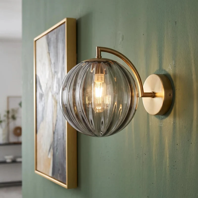 Mid Century Modern Wall Sconce With Wine Red Hand Blown Ribbed Glass Globe Featuring Three Way Color Toggle For Smooth Ambient Lighting That Straight Up Elevates Your Interior Design Level Every Single Day