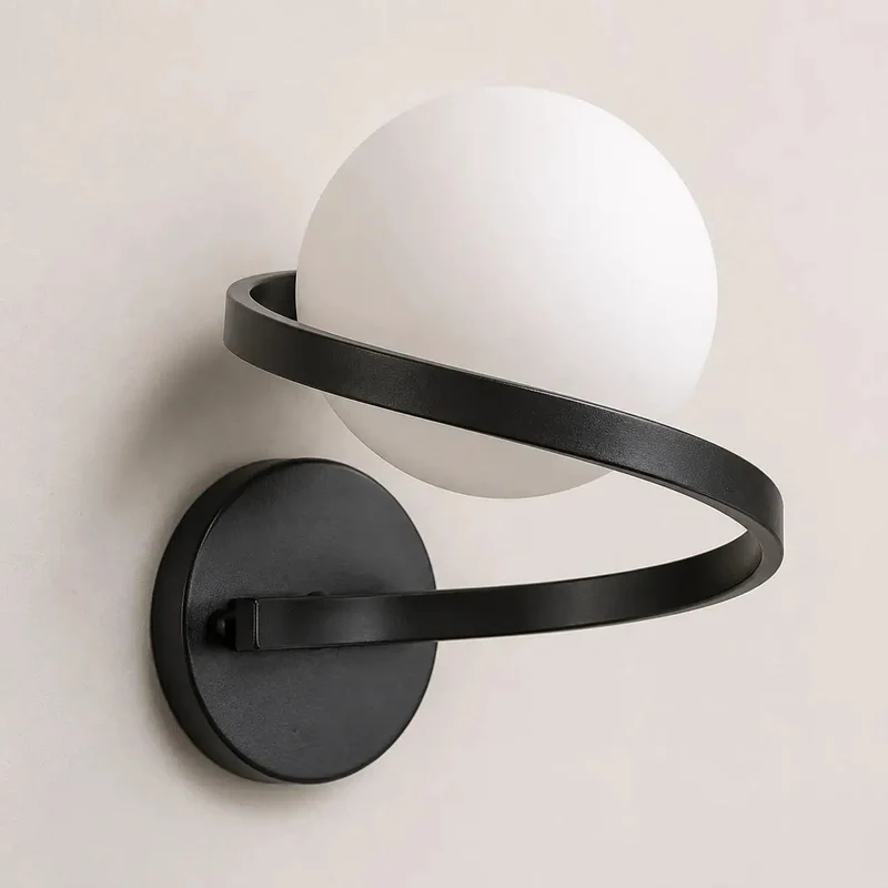 Smooth Black Wall Sconce Featuring Opal Glass Globe And Sculptural Spiral Metal Frame For Contemporary Home Decor Indoor Lighting And Living Room Ambiance