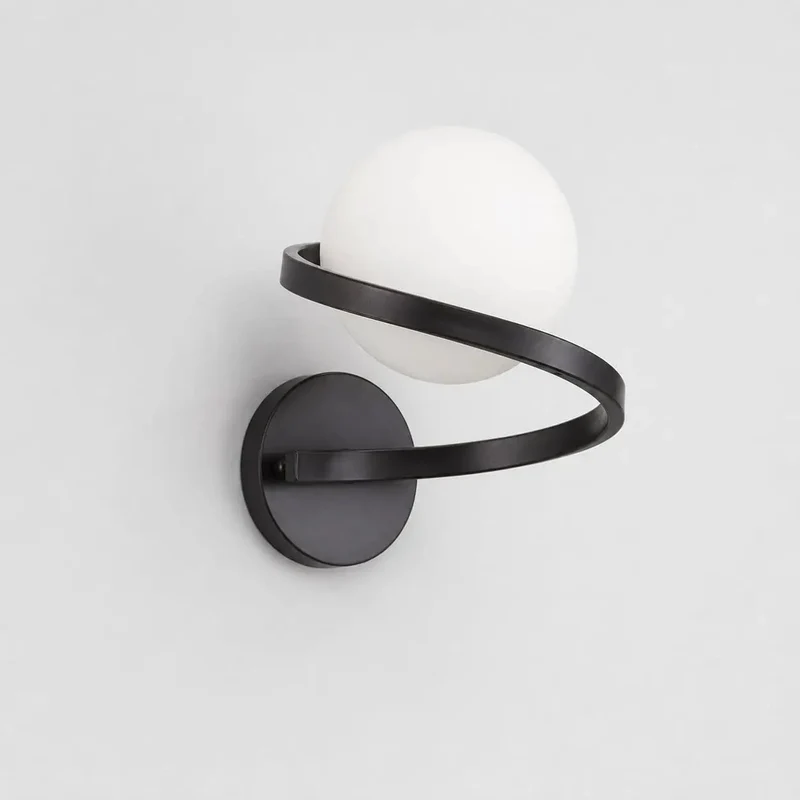 Smooth Black Wall Sconce Featuring Opal Glass Globe And Sculptural Spiral Metal Frame For Contemporary Home Decor Indoor Lighting And Living Room Ambiance