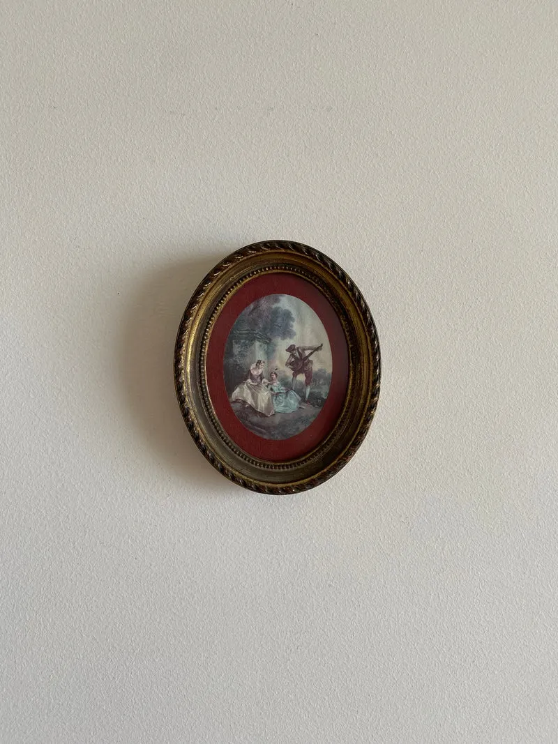 Cadre ovale mordoré en bois bordure bordeau scène d'époque romantique