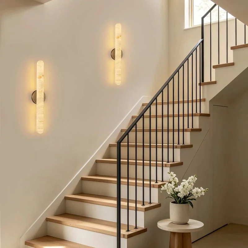 Elegant Alabaster Wall Sconce With Warm Brass Body Delivers Solid Ambient Glow And A Chill Vibe For Bedrooms Living Spaces Or Hallways Standing 24 Inches Tall This Modern Fixture Lights Up Any Room And Has Dope Accent Lighting