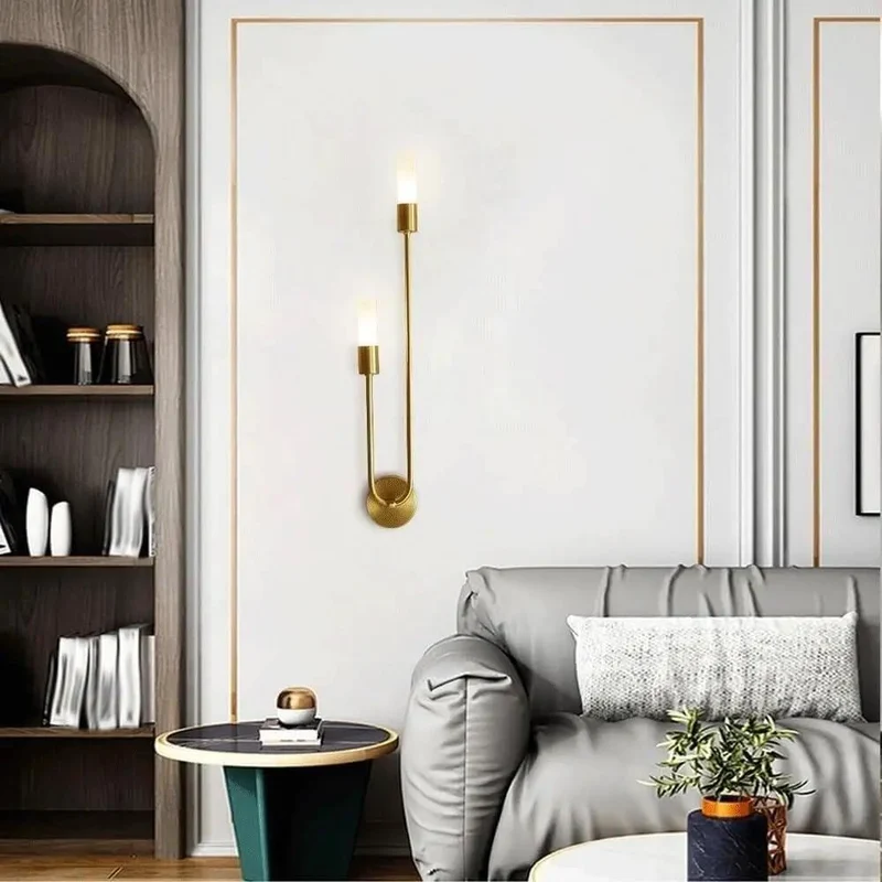 Modern Wall Sconce Featuring Smooth Linear Curves For Totally Fresh Up Down Ambient Lighting Crafted In Premium Brushed Gold Finish To Deliver Major Contemporary Vibes For Bedroom Or Entryway Walls