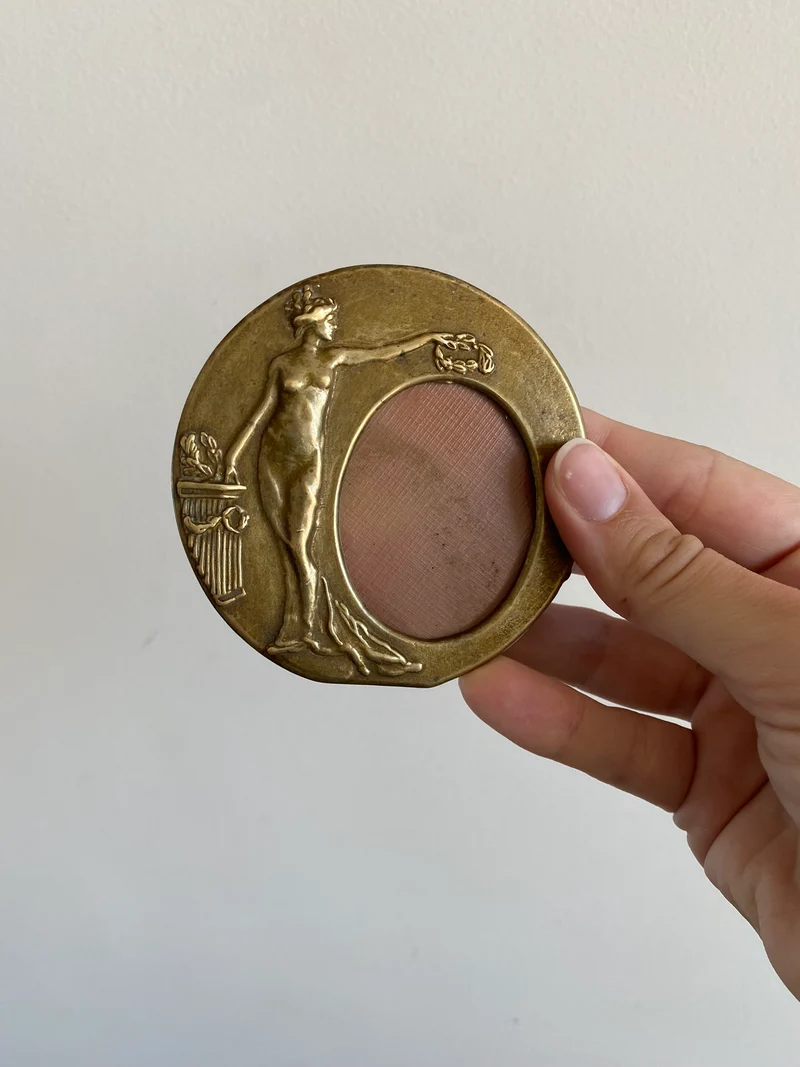Cadres photo en laiton et cadre rond en bronze