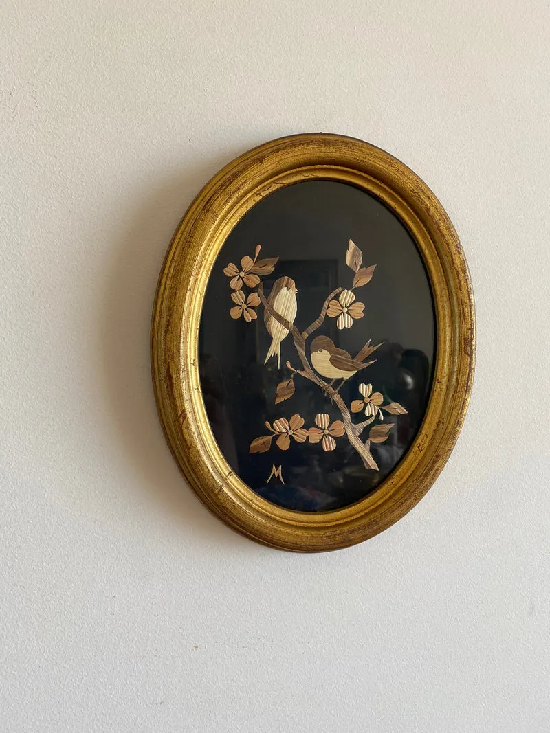Cadre en bois doré avec motifs oiseaux