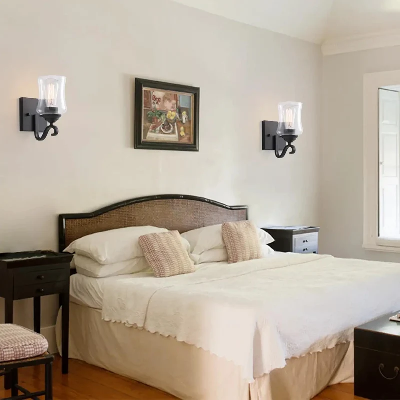 Set Of Two Black Wall Sconces Featuring Clear Glass Shade And Hard Wired E26 Socket Sharp Bath Lighting Duo For Hallway Or Stairwell Supporting Quick Up Or Down Facing Install That Brings Clean Vibes To Any Space