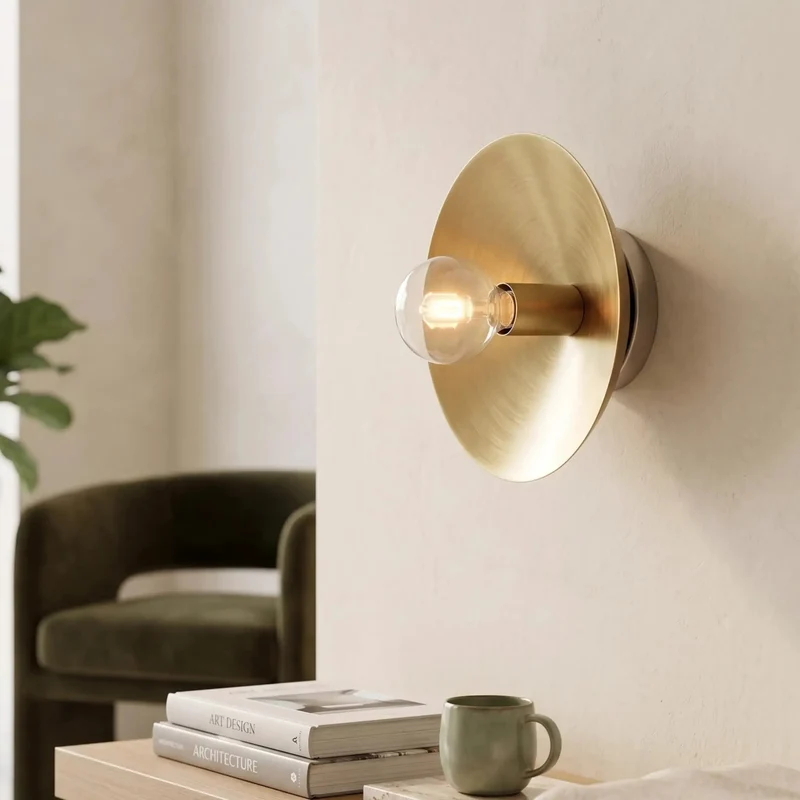 Top Shelf Brushed Brass Wall Sconce With Exposed Edison Bulb And Sleek Round Backplate Bringing Clean Mid Century Modern Bedroom Lighting Vibes To Any Corner