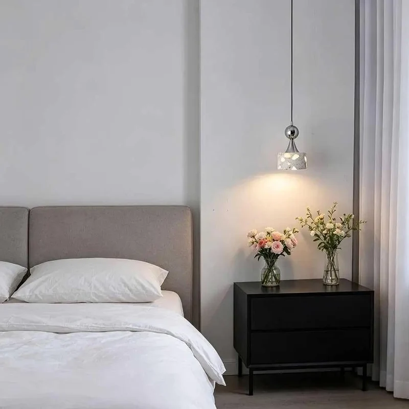 Small Terrazzo Pendant Light Featuring Four Point Seven Inch Polished Chrome Hanging Design to Elevate Your Living Space With Cool Vibes and Sophisticated Aesthetic for Cozy Reading Corners and Warm Downlight Ambiance in Modern Home Decor Settings.